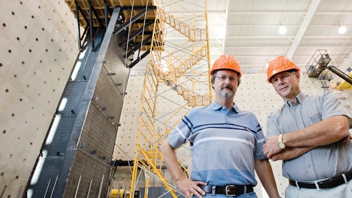 Mark Bowman (right), director of Purdue's Robert L. and Terry L. Bowen Laboratory for Large-Scale Civil Engineering Research, and Michael Kreger, a professor of civil engineering, are working with other engineers to perfect a new kind of 'core wall' for skyscrapers.
