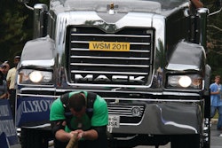 A competitor pulls a Titan by Mack during 'The Met-Rx World's Strongest Man' competition in Charlotte, NC.