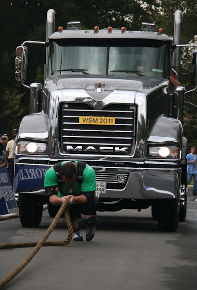 A competitor pulls a Titan by Mack during 'The Met-Rx World's Strongest Man' competition in Charlotte, NC.