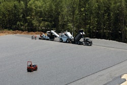 The asphalt was applied in two 4-inch lifts of AS binder containing 10% RAP. The layers were capped with 1.25 inches of Open Graded Friction Course (OGFC) surrounded by riprap.