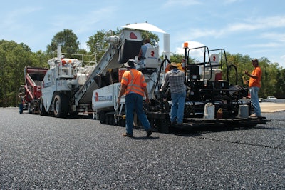 Astec's new paved lot design can retain three inches of water, preventing runoff from being released into a storm drain systems.