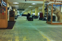 Grand Prospect crews prepped the floor at the Anchorage airport with a ride-on grinder, removing decades of former floor covering adhesives.