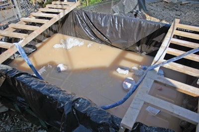 The use of a slurry solidification product, such as the Slurry Slayer, will aid in removing slurry off the jobsite. Photo is before Slurry Slayer.