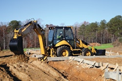 Cat added electronic throttle control and now has auto-idle on a backhoe loader. Stop using the controls for a preset time (typically 5 to 10 seconds) and the system automatically drops engine speed to low idle.