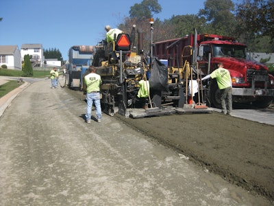 CIR Train using Portland cement placing the center pass of the roadway.