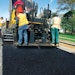 A high-deck configuration results in greater productivity because the operator can focus on keeping the paver moving while screed operators focus on the mat.