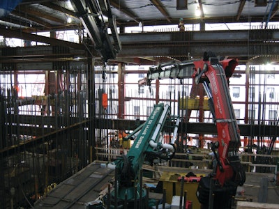 Once the steel rebar was distributed on each floor, the Fassi F800XP would hold the rebar in place for the concrete team.