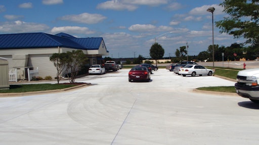 “At our Illinois location, we’ve installed concrete parking lots in some of the most severe weather conditions in the country,” says Len Swederski. Shown here is a fast food restaurant parking lot in Illinois.