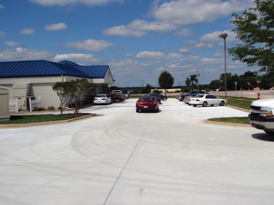 “At our Illinois location, we’ve installed concrete parking lots in some of the most severe weather conditions in the country,” says Len Swederski. Shown here is a fast food restaurant parking lot in Illinois.
