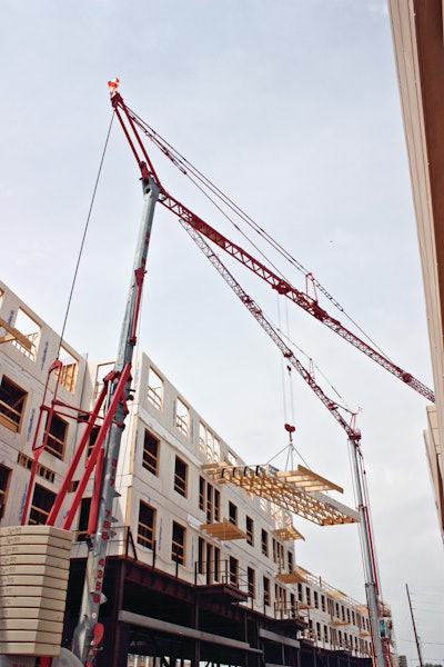 Two Potain HDT 80 self-erecting cranes are helping to build an apartment complex in downtown Indianapolis, IN.