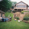 Badger Underground used a Grundodrill 4X compact directional drill to complete a difficult gas, water and sewer line installation in Oconomowoc, WI. The homeowners wanted a trenchless application that would not disturb extensive landscaping.