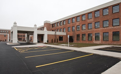 Bush Construction helped to transform a brownfield area in downtown Rock Island, IL, into this attractive 30-unit apartment complex.