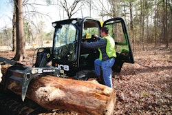 The single boom raising the bucket on JCB's skid steers allows a side-entry door that saves the operator the challenge of climbing over the work tool to enter and exit the machine.