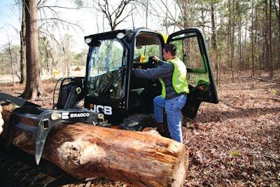 The single boom raising the bucket on JCB's skid steers allows a side-entry door that saves the operator the challenge of climbing over the work tool to enter and exit the machine.