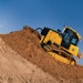 John Deere 750K is a 155- to 165-hp hydrostatic dozer with base weight of 34,377 to 37,595 lbs.