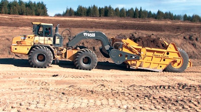 The S4412B scraper system integrates a 44-cu.-yd. bowl with a customized Bell 4206D scraper tractor.