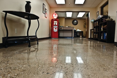 Royale Concrete rescued a 65-year-old concrete floor at a farm chemical warehouse by exposing aggregate and polishing to an 800-grit finish.