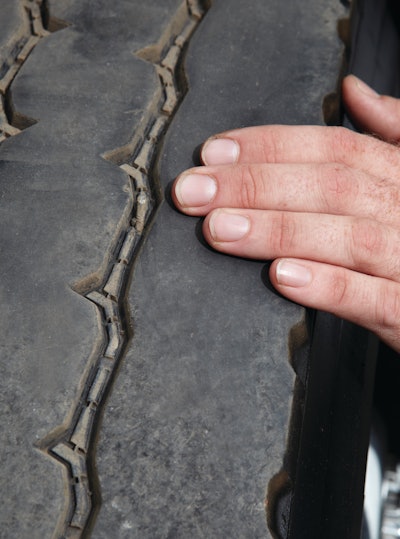 Examine the tread and feel the rubber with your fingertips for imperfections, irregular wear pattern or feathering of the tread blocks. Fingertips are very sensitive to changes in patterns and unusual wear.