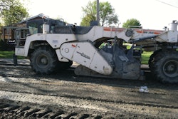 After milling off 3-4 inches of the existing surface, Midwest Stabilization used a Wirtgen 2400 reclaimer to till the cement into the surface.