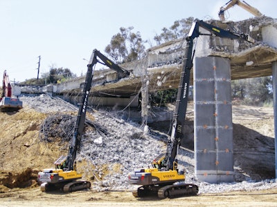 Two Volvo EC460CHR high-reach demolition machines were used to demolish two lanes of the four-lane, 578-foot-long bridge that carries Mulholland Drive across the 405