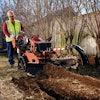 Attaching a crumber or trencher cleaner on the end of the boom can help ensure maximum trench depth is achieved.