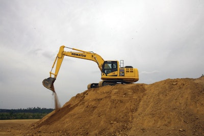 Komatsu claims to get more work out of its PC201LC-10 excavator with less fuel because not only is the new engine more efficient, but the hydraulic system design is integrated with it.
