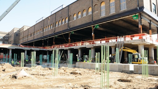 Carl Bolander & Sons drilled and simultaneously grouted four 3-in. self-drilling anchors per column as friction piles to support St Paul's Union Depot concrete rail deck.