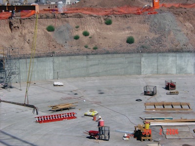 Lift lines are typically caused by color variations between two success lifts of concrete. Lift lines can be minimized by completely knitting successive lifts of concrete together.