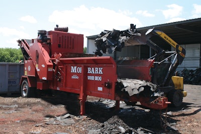 Charles Copley Roofing’s Morbark grinder processes material down to a 1 ½-inch product.