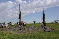 Drilling rigs, like these used for the closed-loop system installed at Lake Land College in Illinois, drill loop fields typically 100 to 300 feet deep.