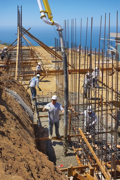 Ekedal Concrete pouring the foundation footings for the architectural finish walls on an Orange County project. 'The walls will have a board form finish, which requires a very involved and exact layout system for all window and door openings along with snap ties holes,' Ryan Ekedal says. 'All the lines and holes need to line up perfectly.'