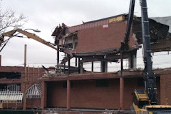 Costello had demolition teams taking down zones of the old high school at the north and south ends simultaneously.