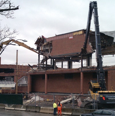 Costello had demolition teams taking down zones of the old high school at the north and south ends simultaneously.