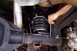 The Ride-Rite kit, which mounts between the truck's frame and suspension, uses air pressure to maximize the truck's safe load carrying capacity.