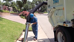 Tymco's hydraulic boom-assist hand hose enables the operator to clean catch basins and hard-to-reach areas.