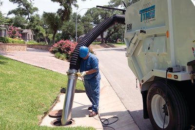 Tymco's hydraulic boom-assist hand hose enables the operator to clean catch basins and hard-to-reach areas.