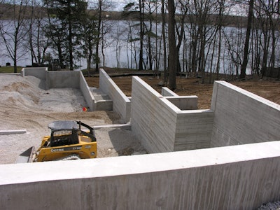 Coello & Associates was one of the CFA Project of the Year award winners for its exposed concrete residential foundation with wood grain texture walls.