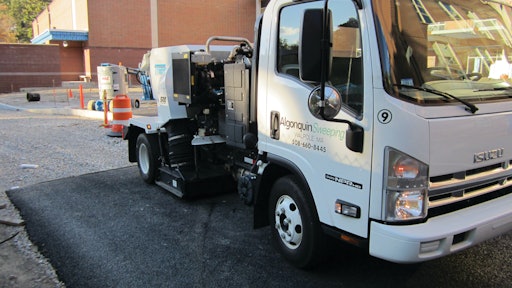 Algonquin Sweeping & Striping of Walpole,MA, completed construction site sweeping of porous pavement at Wellesley High School. Operators ran the Tymco 210 unit at a fairly low RPM increasing it to about 2200 RPM with each pass.