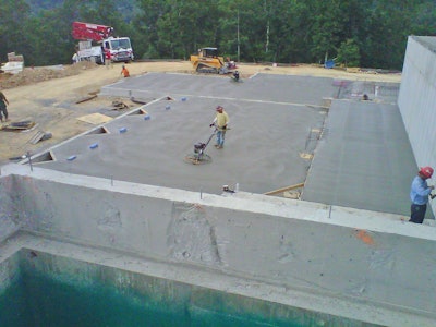 Finishing the foundation slab at the White Sulphur Springs project.