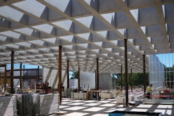 The concrete coffered ceiling at the St. Louis Art Museum was formed with more than 1,600 cubic yards of concrete poured in place to form a 48-inch-tall framework with 698 rectangular openings that let in light from above.