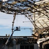The dome's roofing materials - a compilation of over 16 inches of lightweight concrete, foam insulation, built-up roofing material and thin copper sheeting - were removed manually.