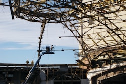 The dome's roofing materials - a compilation of over 16 inches of lightweight concrete, foam insulation, built-up roofing material and thin copper sheeting - were removed manually.