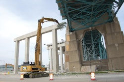 Adamo Group used an Apex 70 Ultra High Demolition Hydraulic Excavator to remove a 65-foot-tall pier located within a few feet of Detroit's Ambassador Bridge.