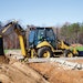 The Caterpillar F Series models feature an electronically controlled piston pump that automatically optimizes performance for specific operations, ensuring loader power management and backhoe productivity.