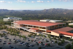 Rendering of the 520,000-square-foot Bob Hope Airport Regional Intermodal Transportation Center structure on the left, the customer service building and a portion of the 1,100 foot-long moving elevated walkway on the right.