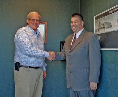 Haulotte's Chuck Hutchinson (left) recently retired; Brian Burket was named vice president of scaffold sales.
