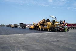 To help assure non-stop paving, the crew waited until at least three trucks were in front of the paver before starting each pull.