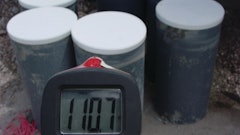 Field-cured test cylinders should be cured in the same manner as the concrete they represent. The temperature-time history of the test cylinders should match the in-place concrete curing conditions. In this case, the field-cured test cylinders overestimated the in-place concrete strength because they were sitting adjacent to a jobsite heater..