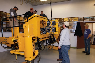 GOMACO University combines classroom learning with hands-on machine experience. In the shop area, students work out problems on GUS II, one of the University's trainers.