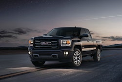 2014 GMC Sierra pickup had projection-beam headlights with LED accent lights. Tight front grille is designed for maximum cooling and better aerodynamics.